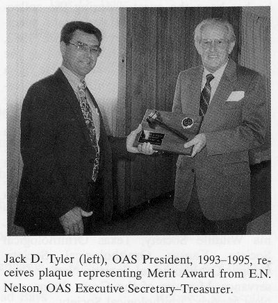 Photo of Jack D. Tyler receiving award from E. N. Nelson